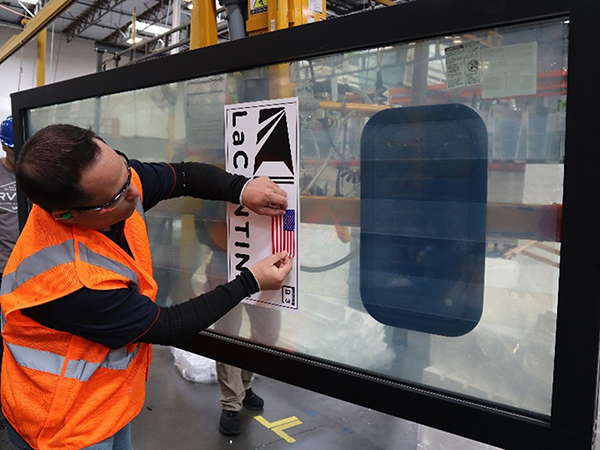 JELD-WEN employee gets a La Cantina door ready for the home